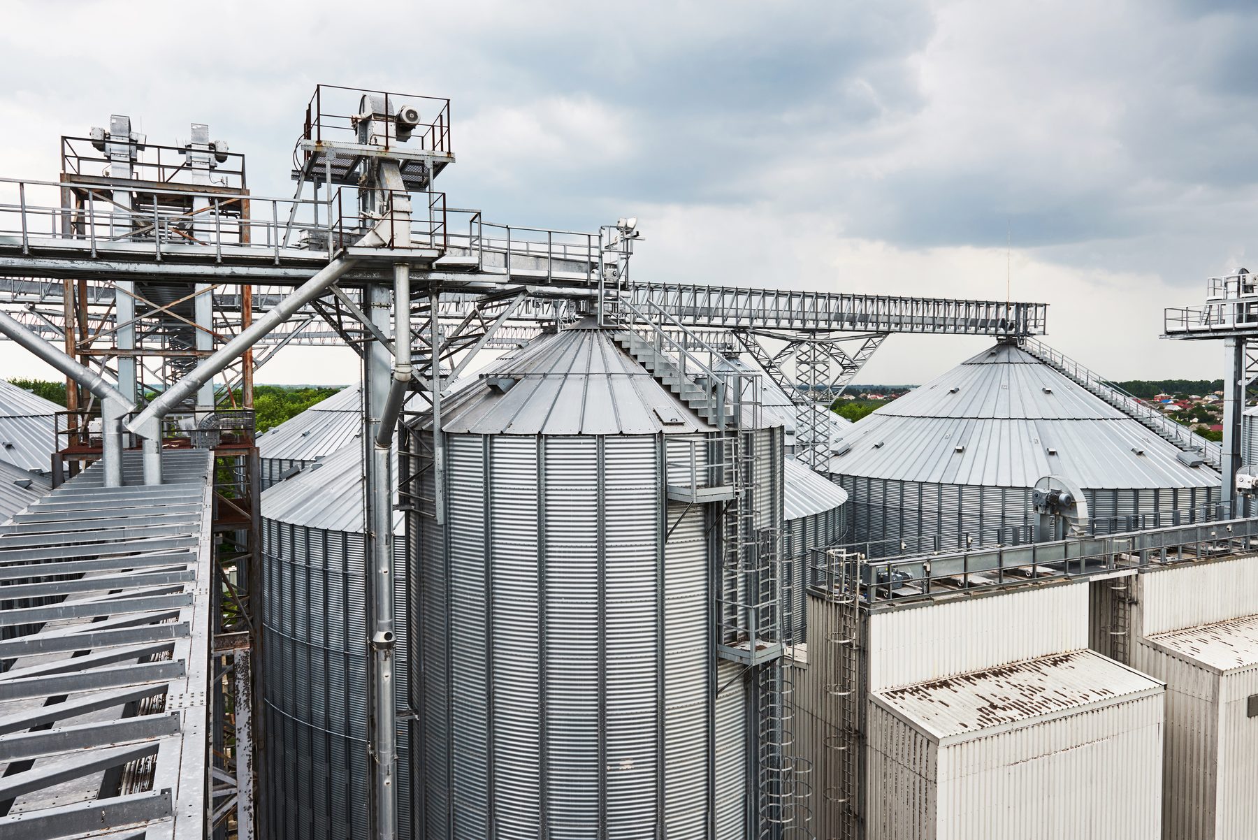 Aerial view of grain storage silos on an integrated milling campus
